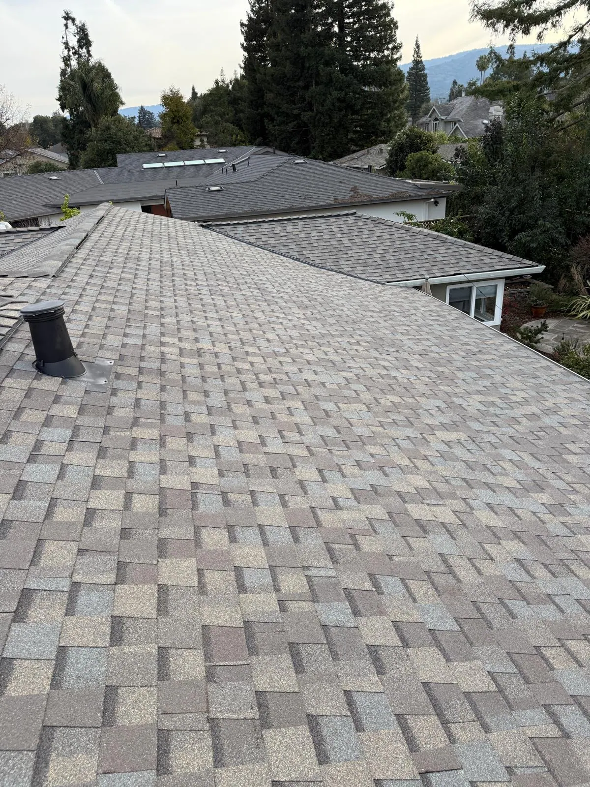 Multi-plane residential shingle roof