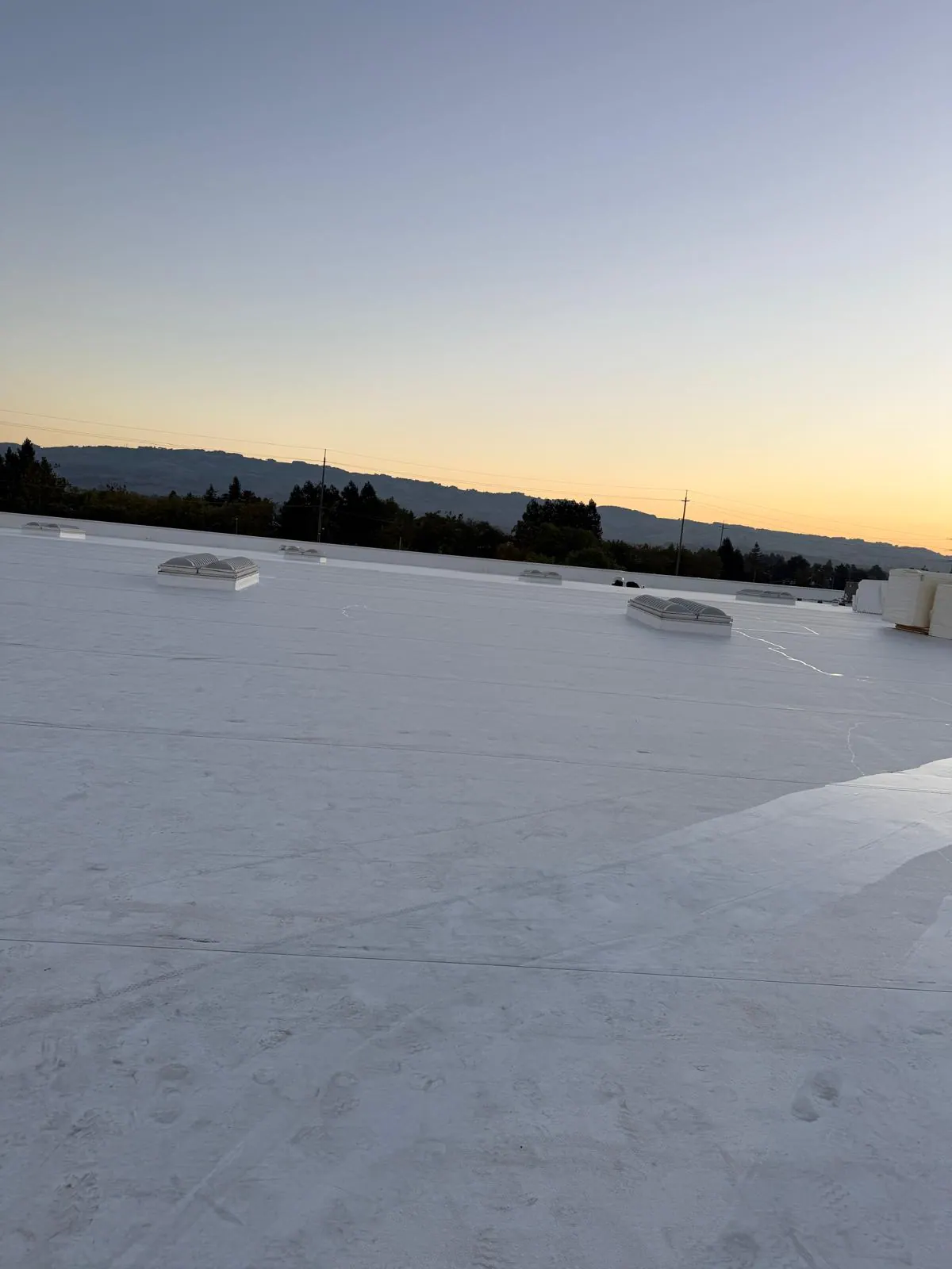 Low-slope roof at dusk