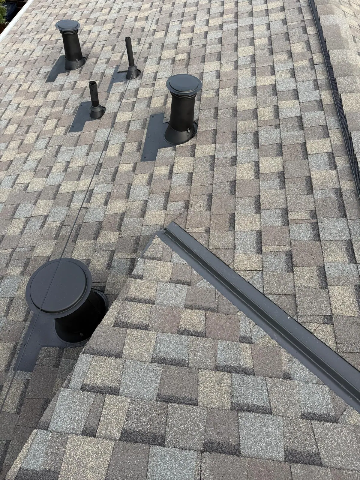 Roof vent and shingle detail