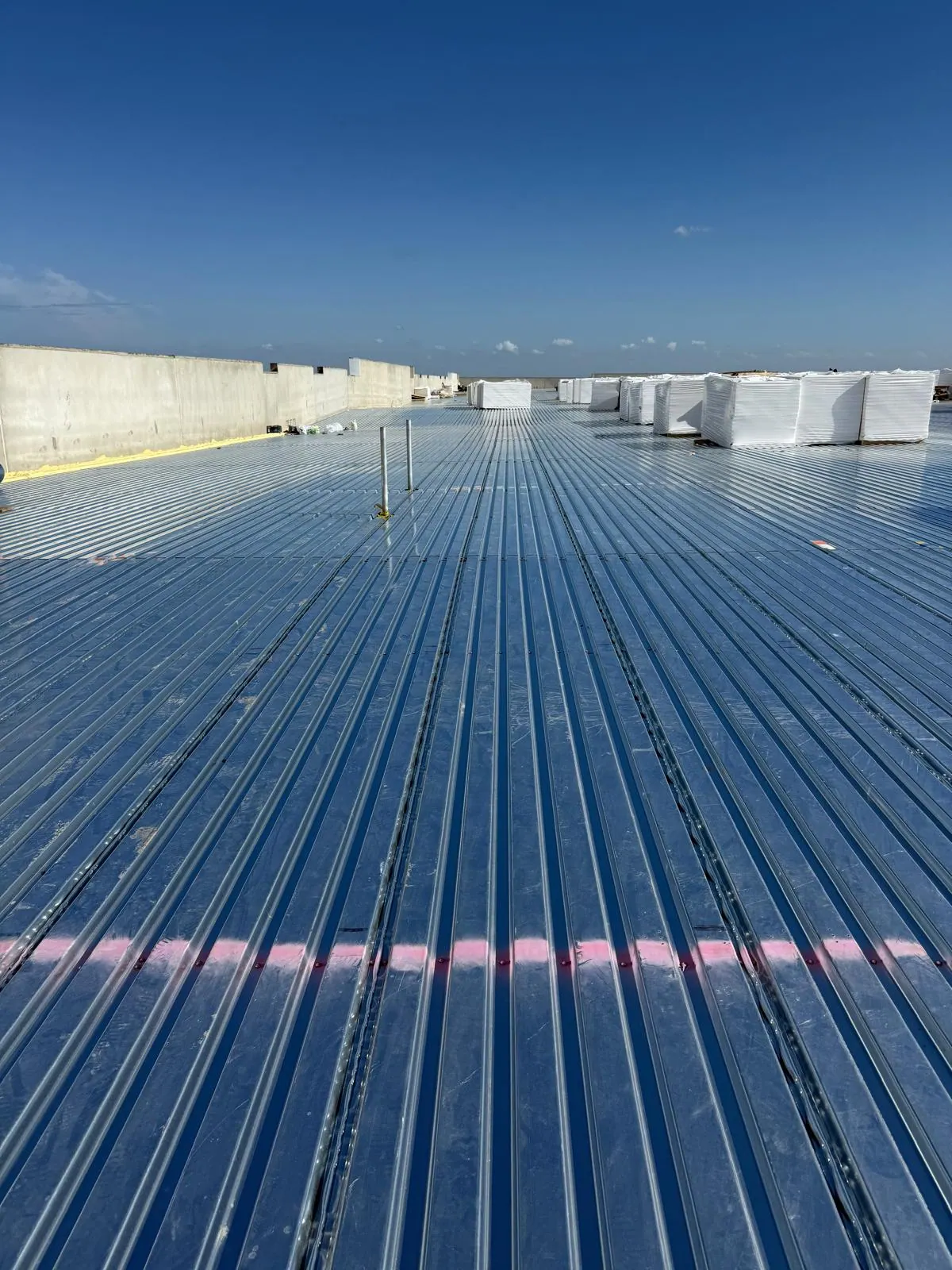 Standing-seam metal roof surface